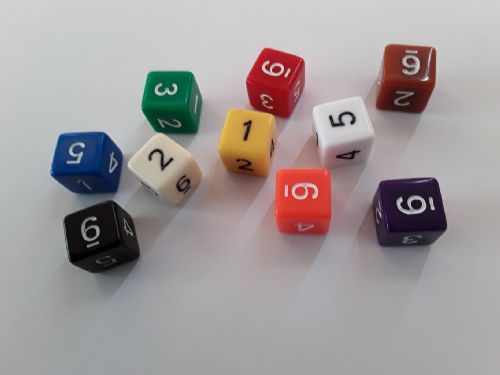 Brown opaque with white numbers six sided dice D6